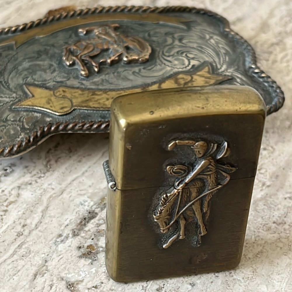 Vintage Western Zippo Bronco Busting lighter Brass circa 1940’s buckle sold sep.